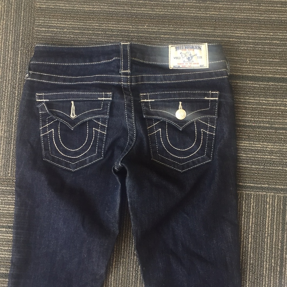 True religion dark wash jeans.